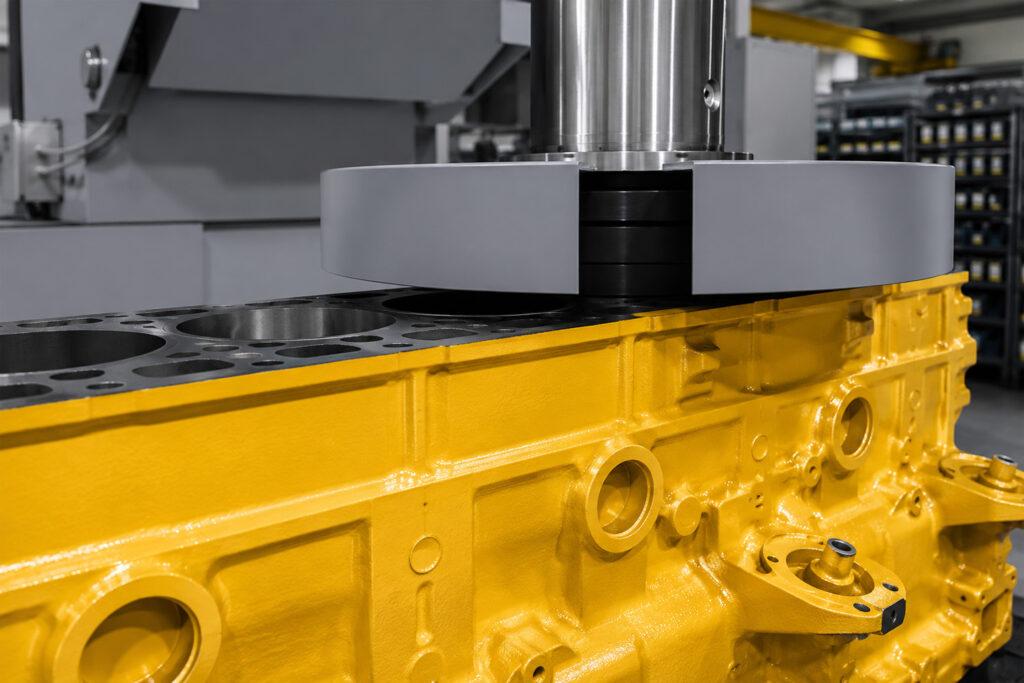 Close-up of the boring head on the Winona Van Norman VBX Vertical Boring Machine showcasing the precision cutting assembly used for accurate cylinder boring.