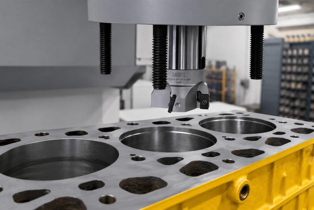 Close-up of the boring head on the Winona Van Norman VBX Vertical Boring Machine showcasing the precision cutting assembly used for accurate cylinder boring.
