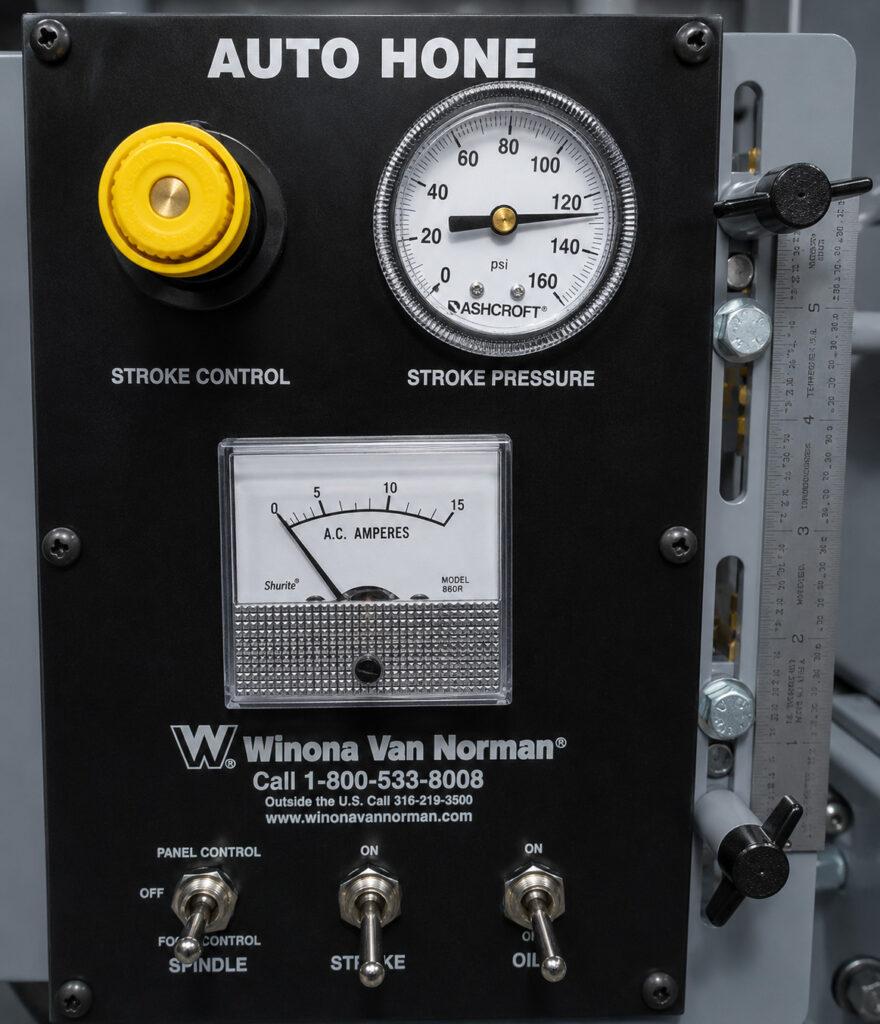 Close-up view of the control panel on the Winona Van Norman PS2300D Power Stroke Hone featuring operator controls, adjustment settings, and machine operation interface.