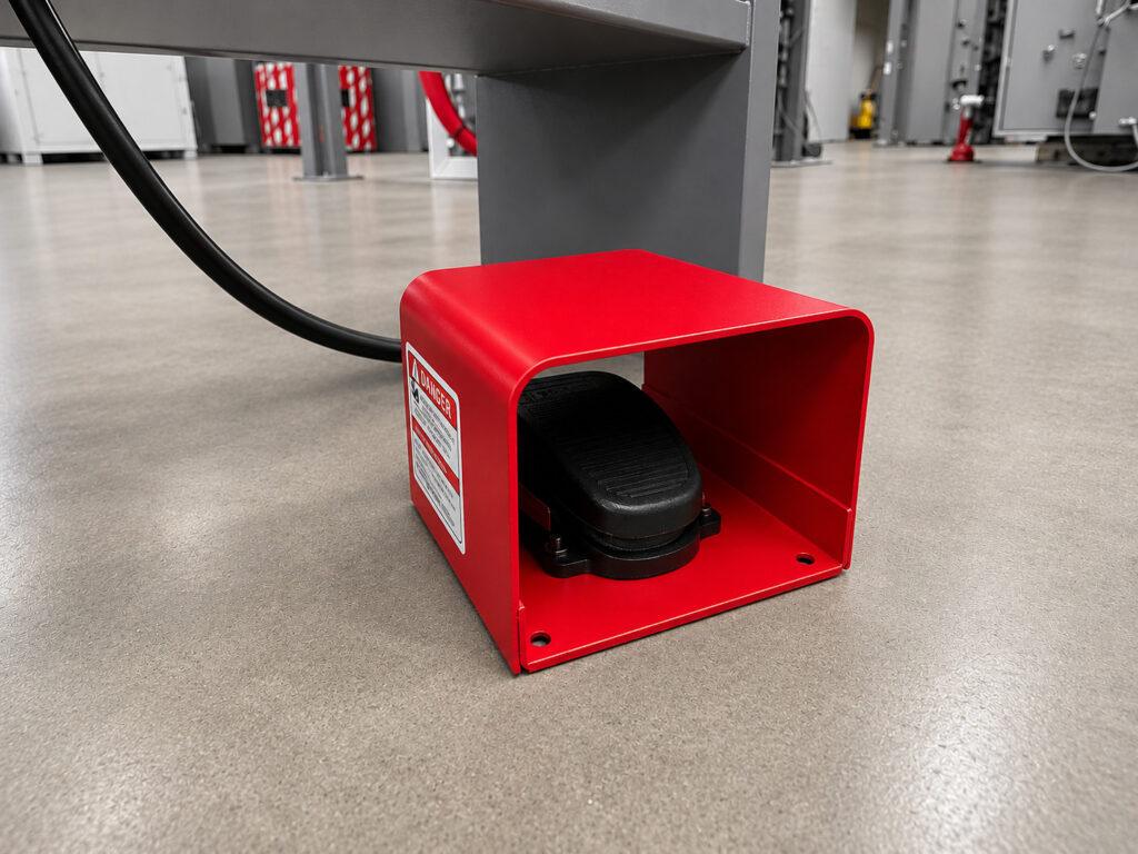 Close-up of the foot pedal on a Winona Van Norman Platen Grinder providing hands-free control during precision grinding operations.