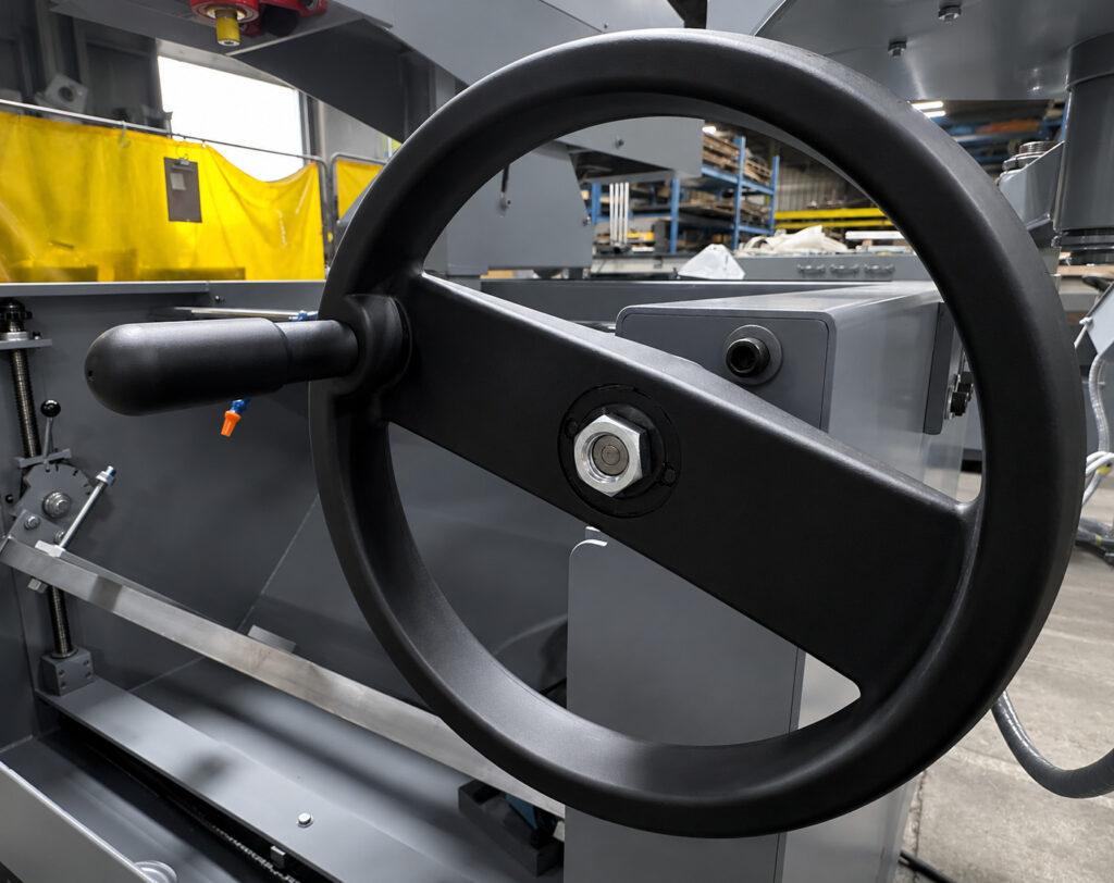 Close-up view of the head moving wheel on the Winona Van Norman PS2V Power Stroke Hone used for smooth, precise positioning of the honing head during machine setup and operation.