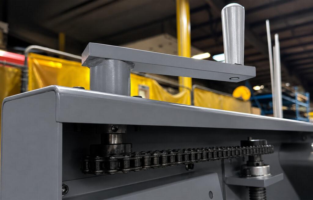 Close-up view of the height adjustment knob on the Winona Van Norman PS2V Power Stroke Hone used to precisely position the honing head for different engine block heights.