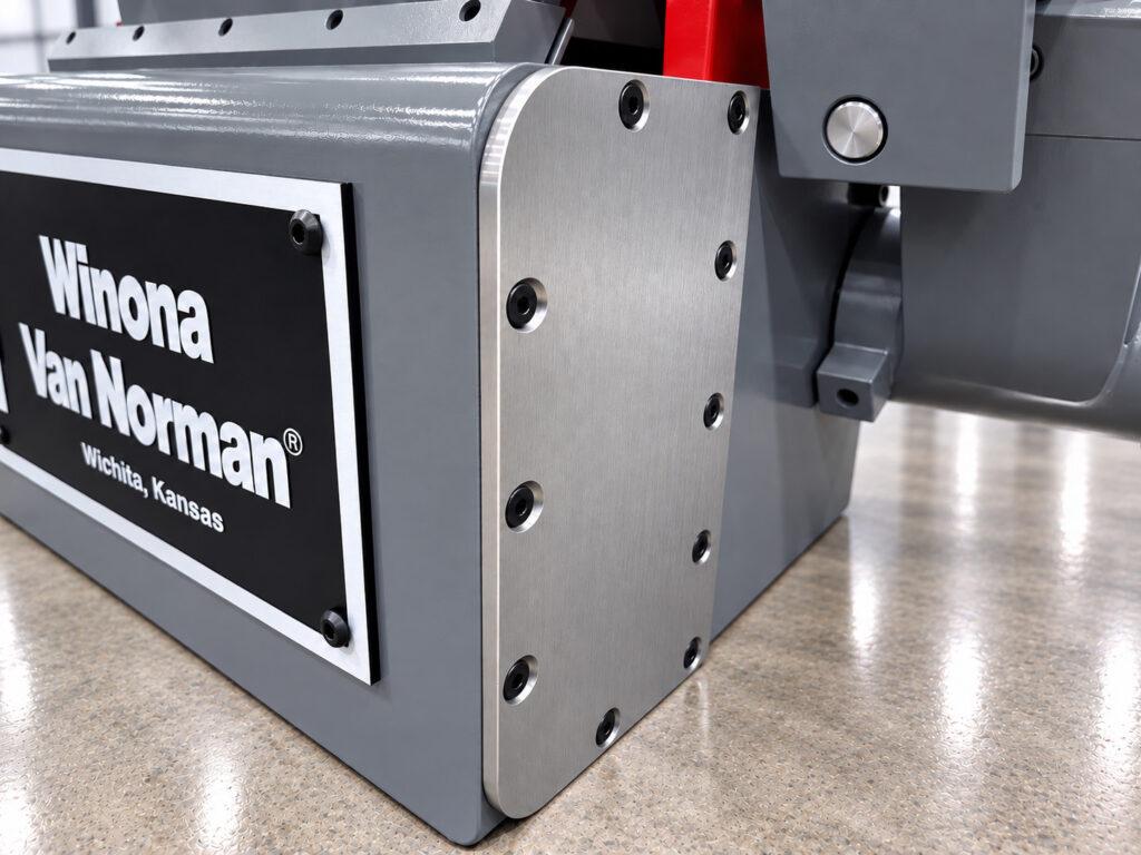 Level plate on the Winona Van Norman CRG170 Cap and Rod Grinder used to properly position and level the connecting rod for accurate grinding.
