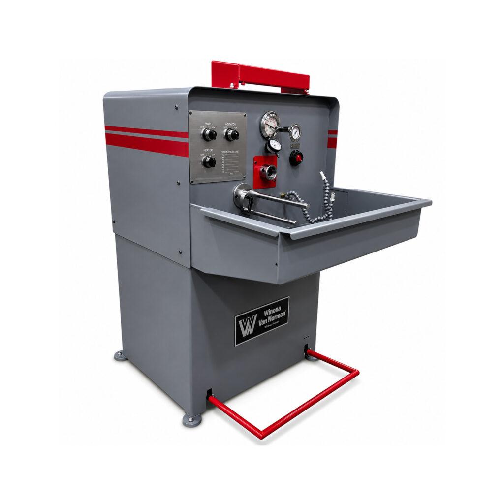 Angle view of the Winona Van Norman Rod & Pin Hone showcasing the precision honing head, work area, and heavy-duty machine construction.