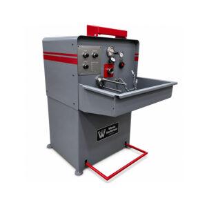 Angle view of the Winona Van Norman Rod & Pin Hone showcasing the precision honing head, work area, and heavy-duty machine construction.