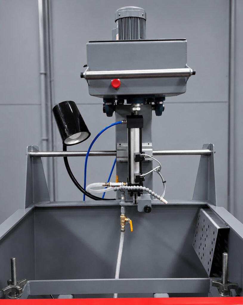 Close-up view of the front honing head on the Winona Van Norman PS1370 Power Stroke Hone showing the precision spindle, tooling interface, and heavy-duty machining components.