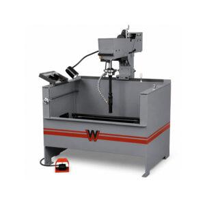 Angle view of the Winona Van Norman PS3301 Power Stroke Hone showcasing the heavy-duty frame, precision honing head, work table, and operator controls.