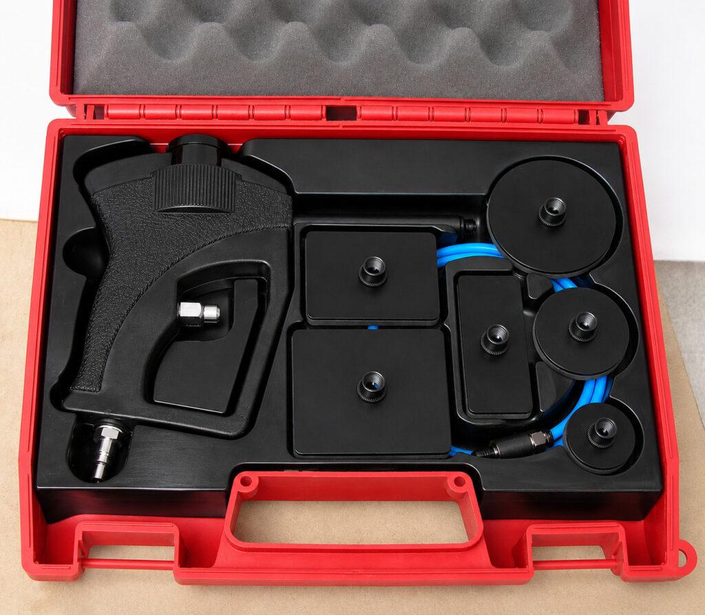 Winona Van Norman Vacuum Tester Kit neatly organized inside its protective carrying case with testing accessories and vacuum gauges.