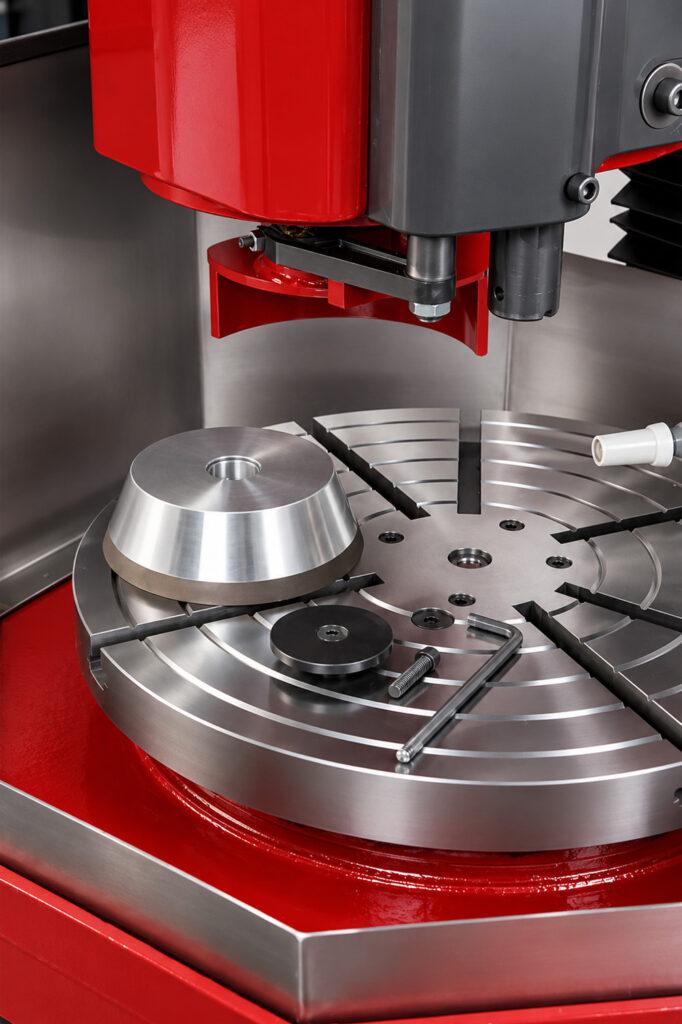 Close-up view of the Winona Van Norman Flywheel Grinder highlighting the precision grinding assembly, worktable, and machining components.