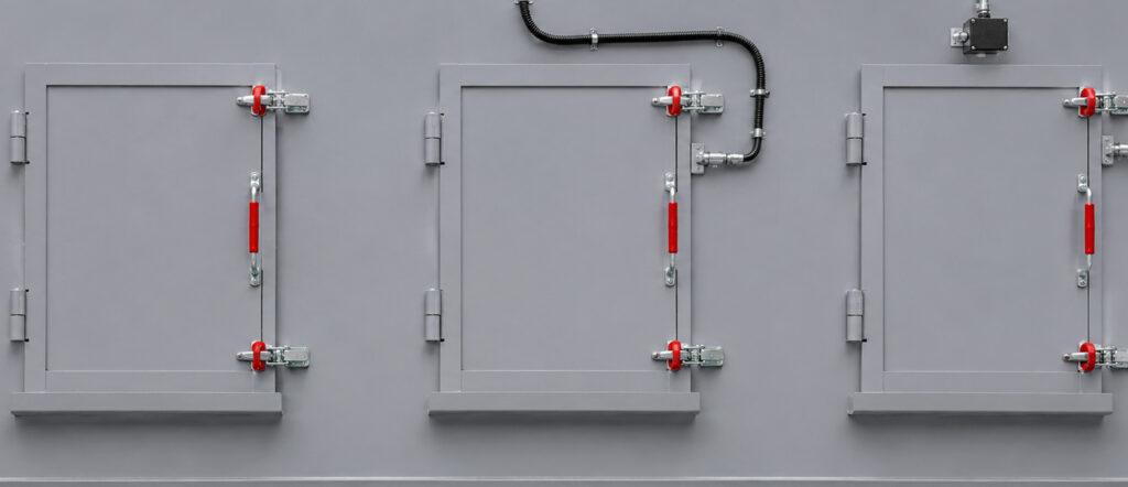 Close-up of the access panels on a Winona Van Norman Flow Through Washer providing convenient access for maintenance and service.