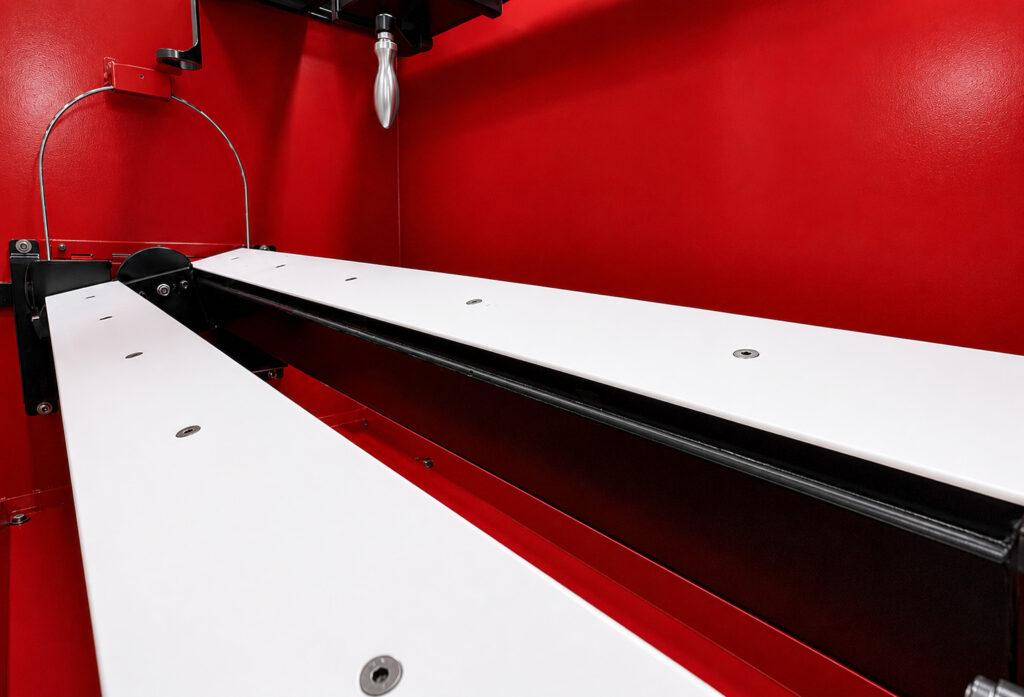Close-up of the internal work table on a Winona Van Norman Disassembly Bench providing stable support for engine heads, blocks, and precision engine components.