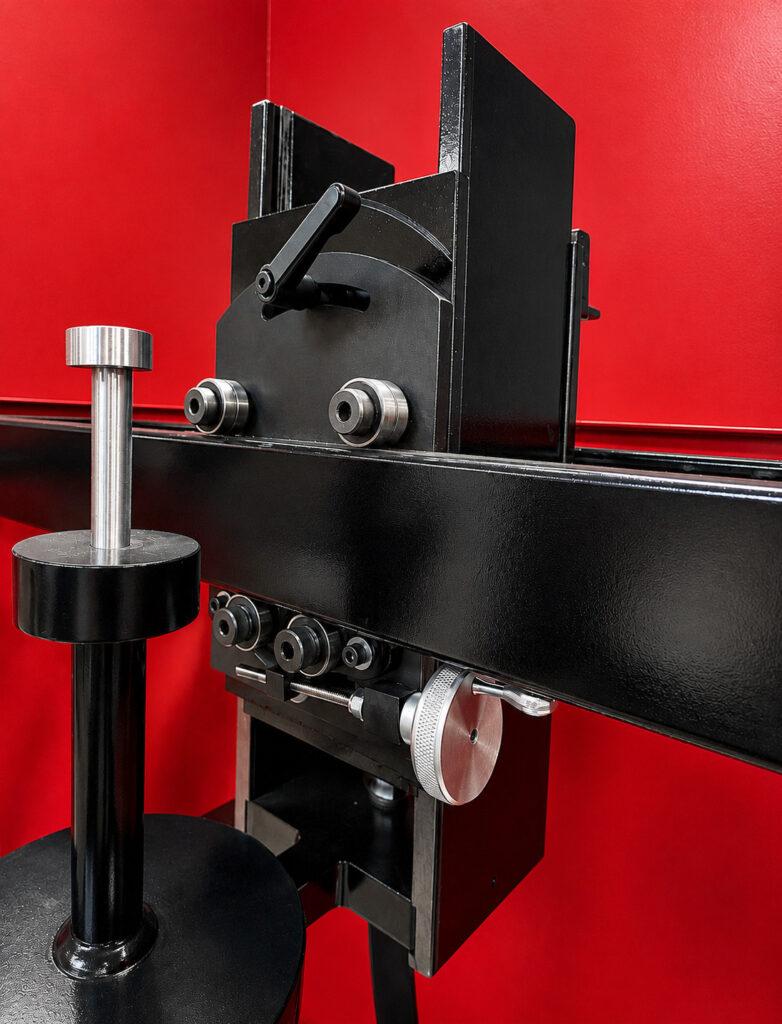 Close-up of the tilt adjuster on a Winona Van Norman Disassembly Bench allowing precise positioning of engine components for improved accessibility during service