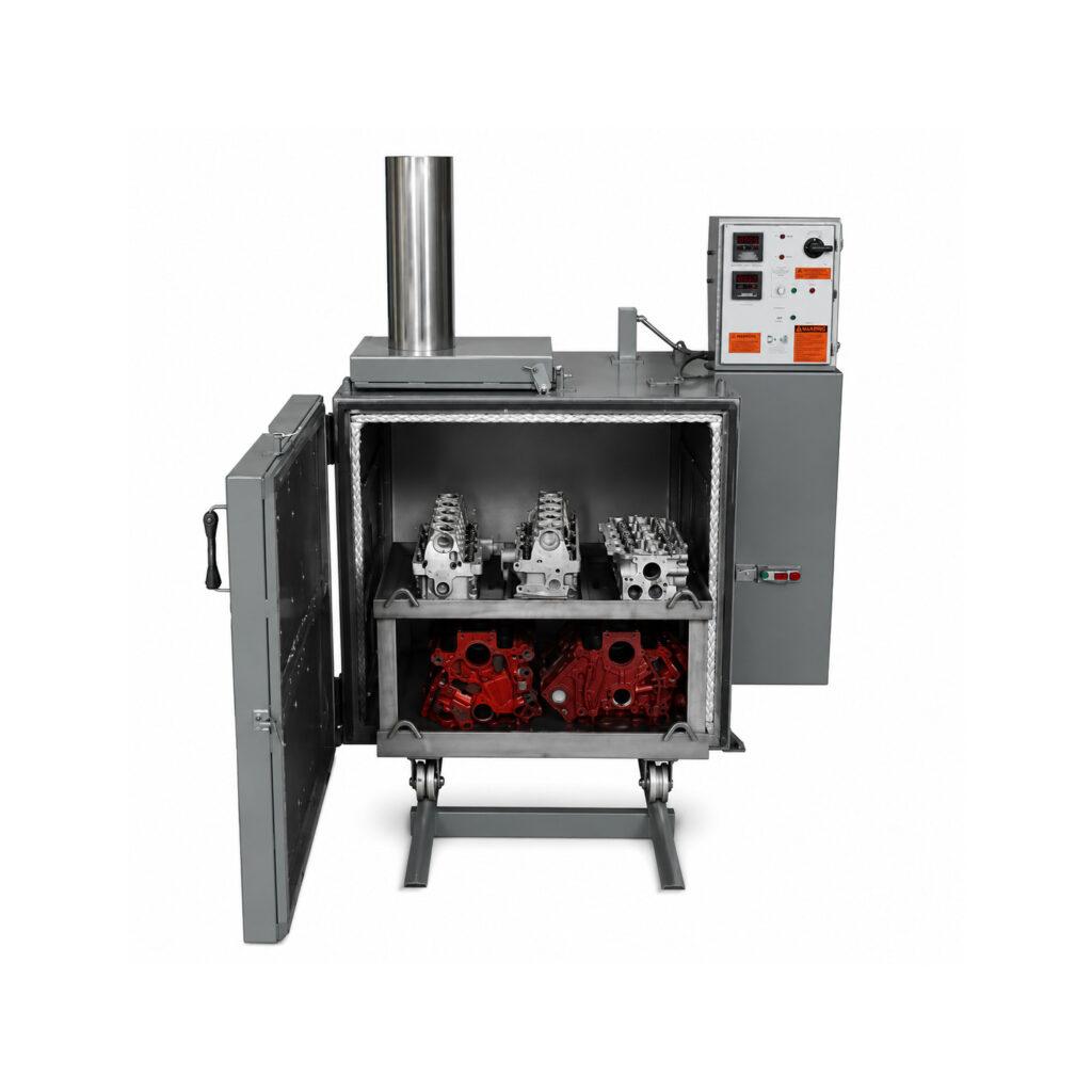 Angle view of a Winona Van Norman Slow Bake Oven designed for controlled heating and curing of engine components and industrial parts.