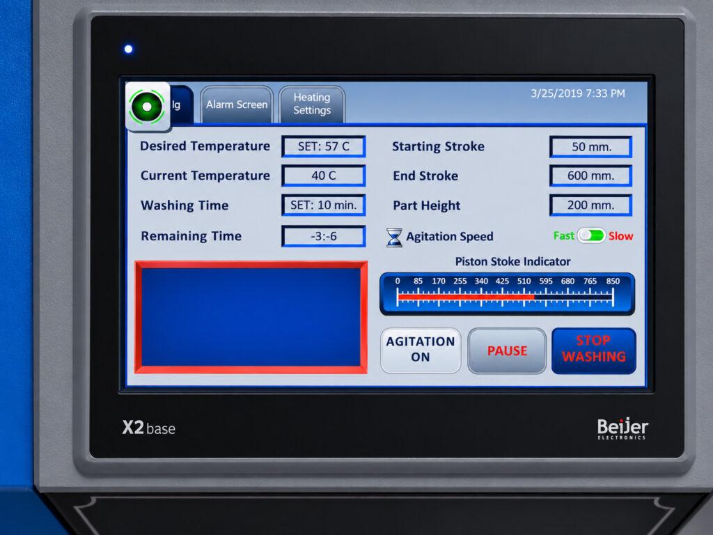 HMI control panel display on a Winona Van Norman PAX Agitation Washer providing touchscreen control and monitoring of the engine component cleaning process.