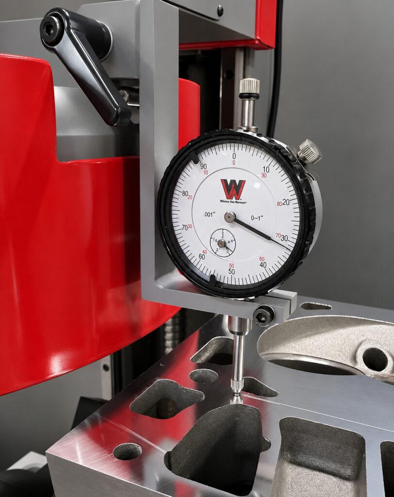 Close-up of the surface finish tester used to inspect machined engine components after resurfacing with the Winona Van Norman SM-E Surface Milling Machine.