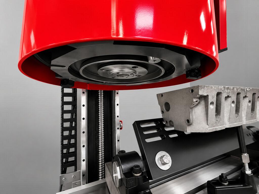 Underside view of the Winona Van Norman SM-E Surface Milling Machine head showing the precision milling cutter and machining system.
