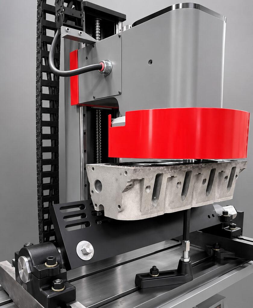 Close-up of the Winona Van Norman SM-E Surface Milling Machine head resurfacing an engine block, highlighting the precision milling cutter and machining process.