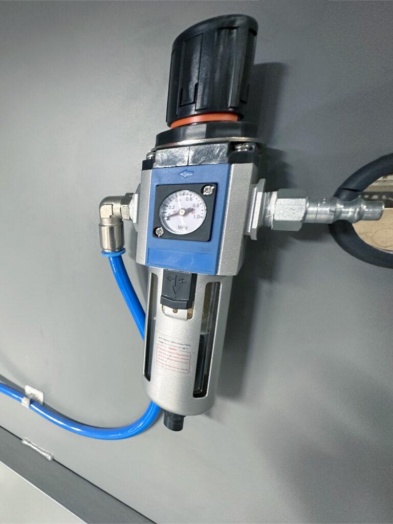 Photo of the polisher Arm on a Automated Crankshaft Polisher