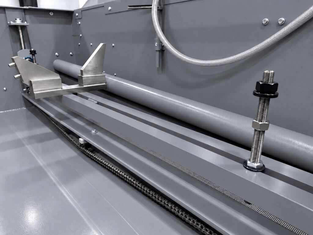 Adjustable cradle on the Winona Van Norman LH3X Line Hone designed to securely support, position, and align engine blocks during precision line honing.